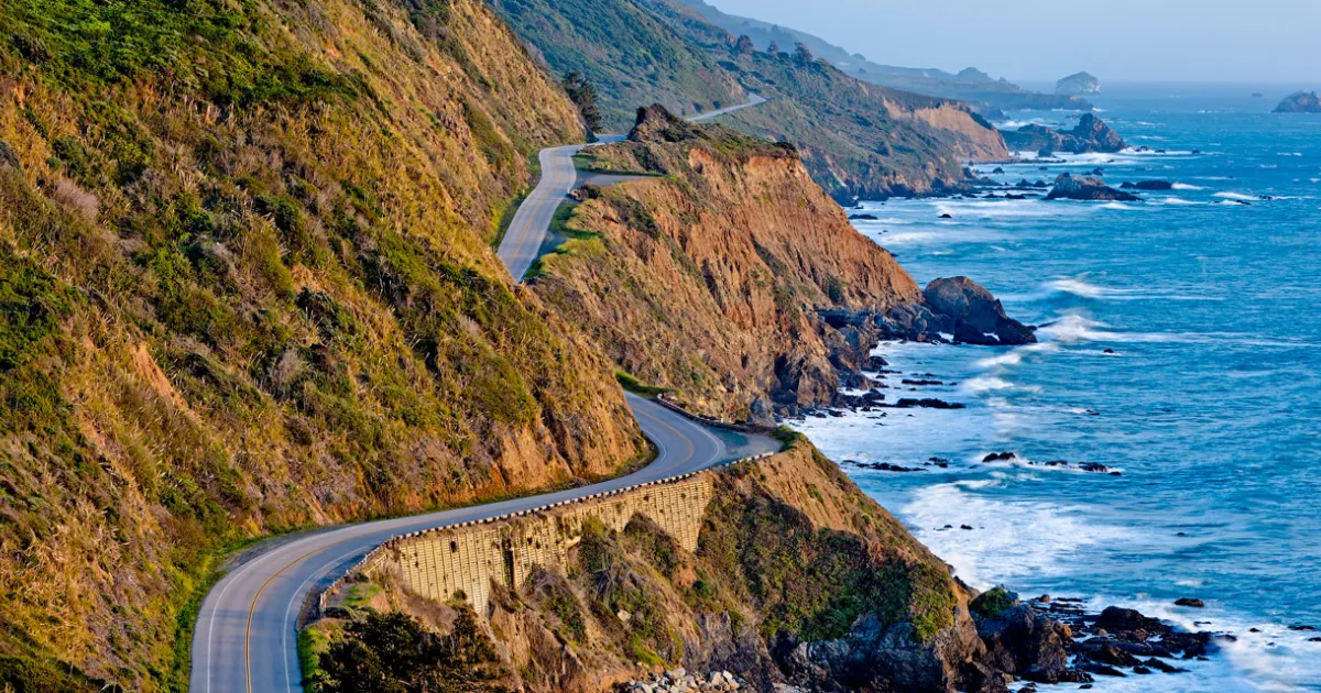 Big Sur highway curves along dramatic cliffs