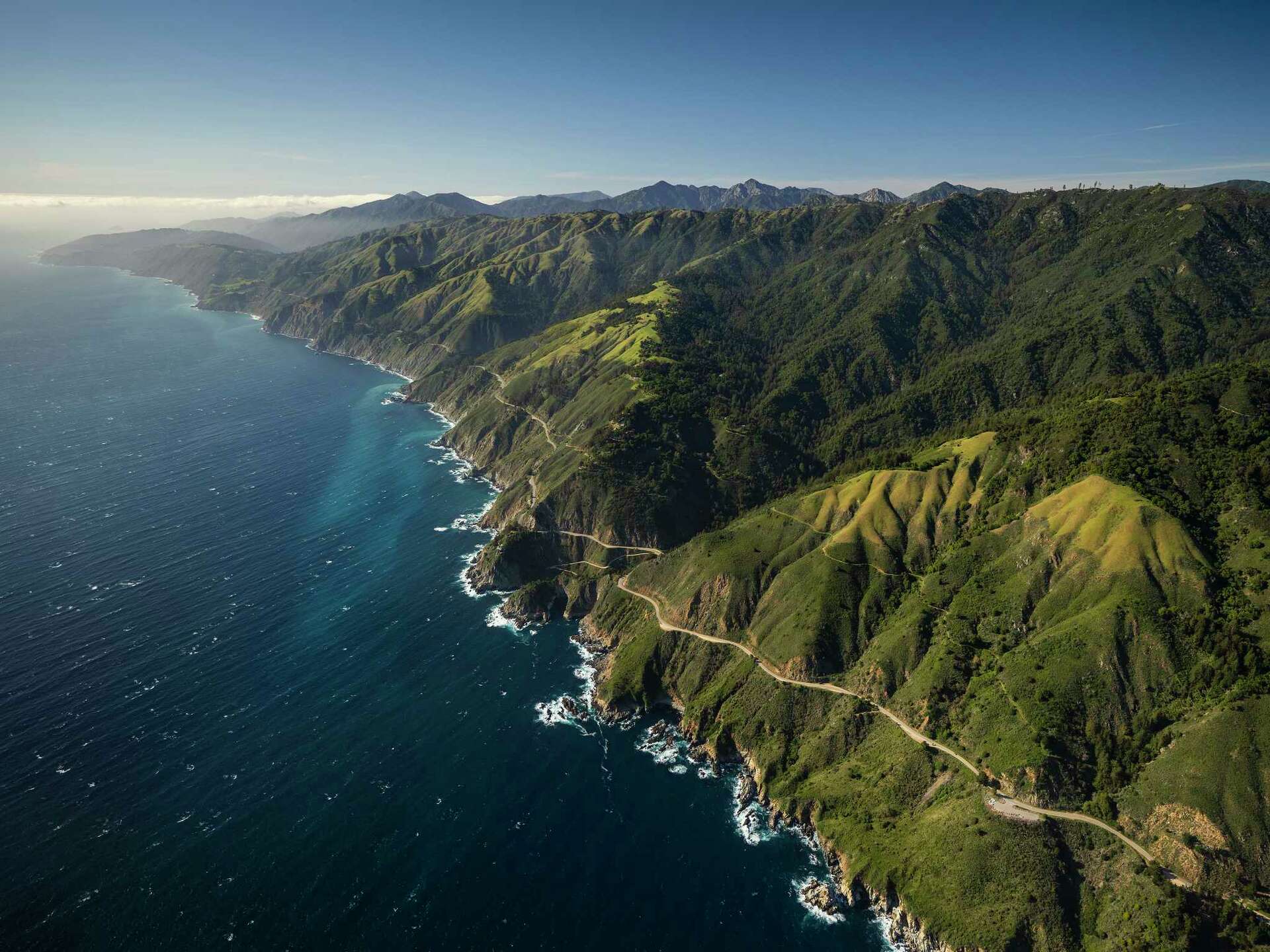 Aerial view of Highway 1 winding along Big Sur coast
